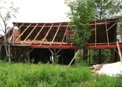 Cottage roof renovation in progress by Revel Homes