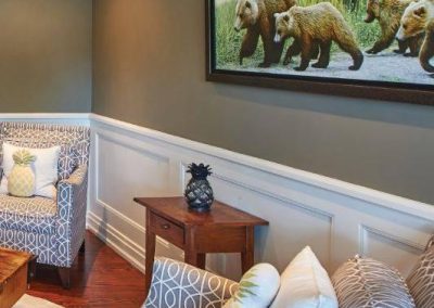 Living room renovation with wainscoting by Revel Homes